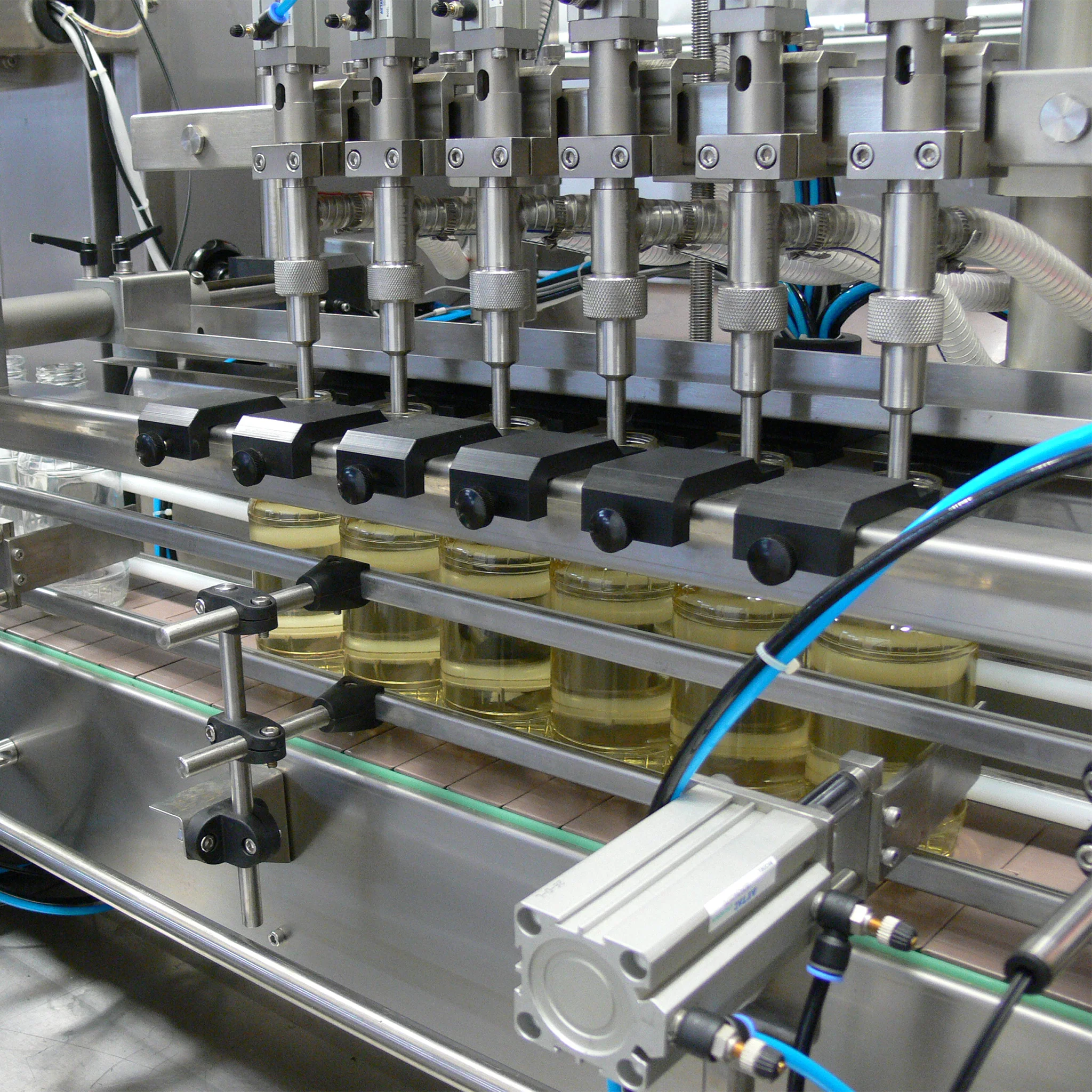 6 Head Inline Gravity Filling System with Conveyor - 1000 ml - Image 7